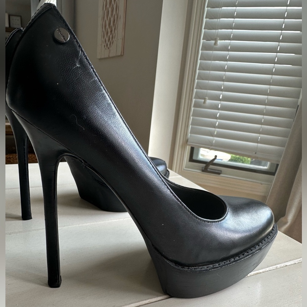 Calvin Klein high heels 7.5